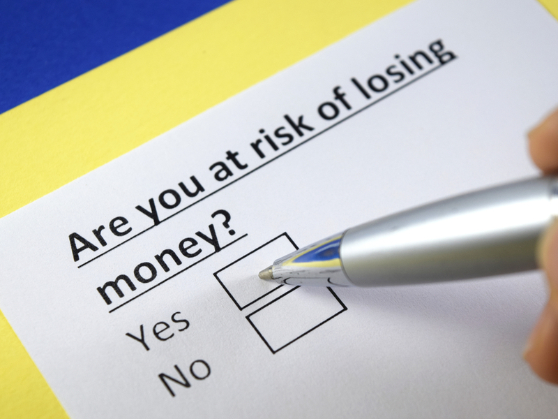 check box on paper "are you at risk of losing money?" yes or no